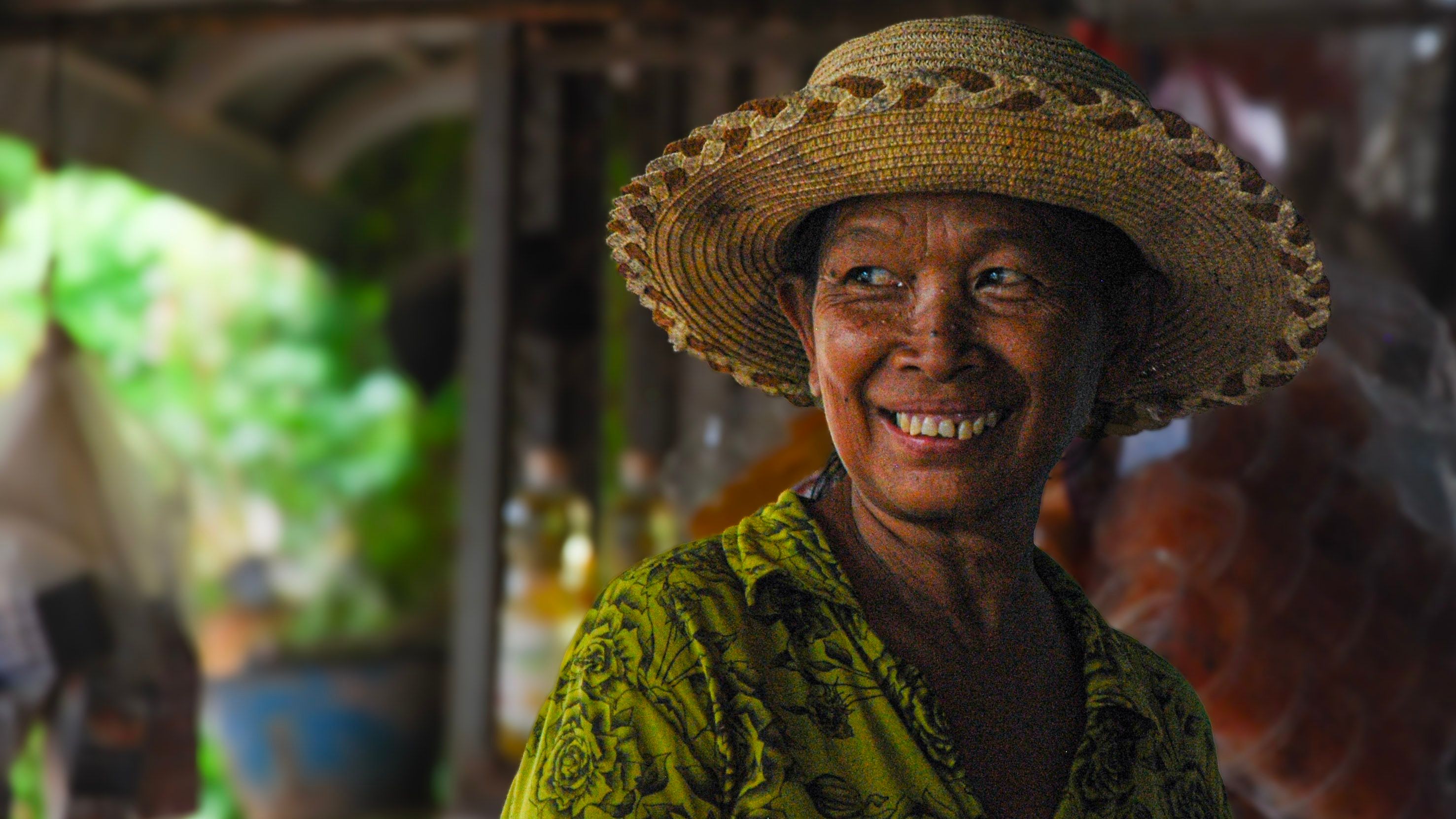A Kampot villager smiling warmly at the camera