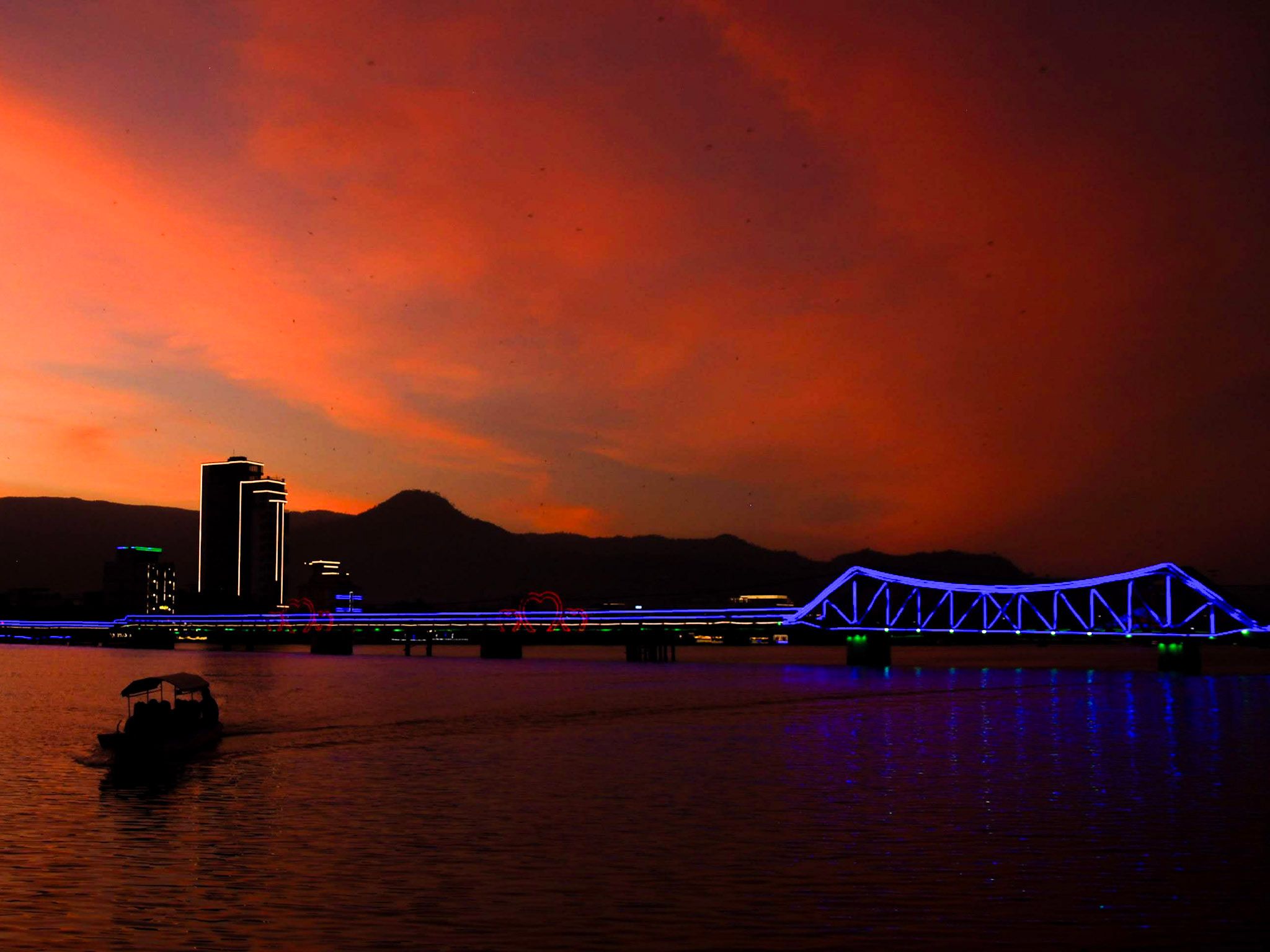 The sun setting over the Kampot river